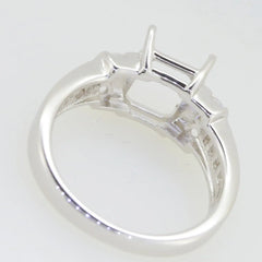 Sterling silver semi mount ring setting with prongs for 9x7mm gemstone, showcasing intricate design and 925 hallmark.
