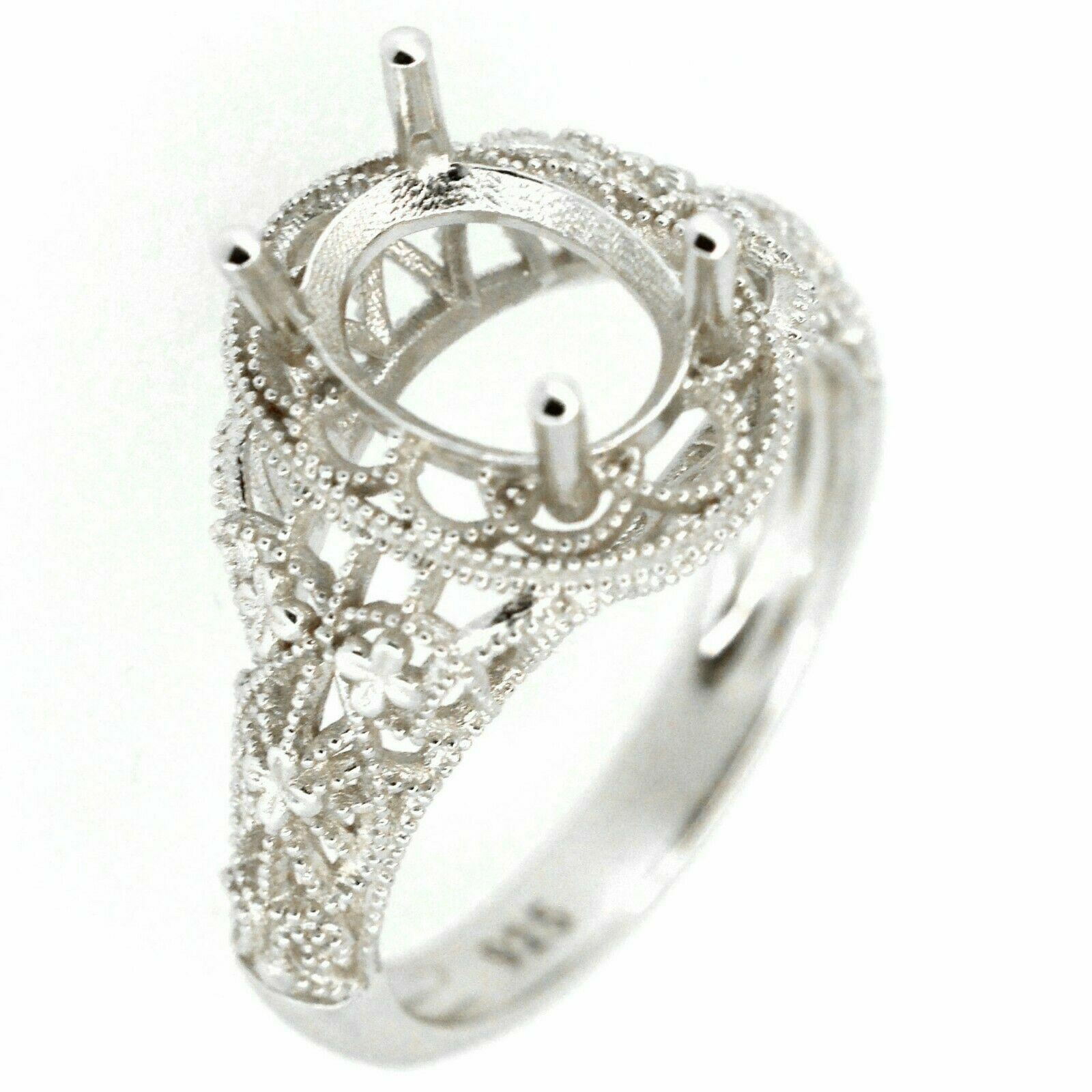 Filigree sterling silver semi mount ring setting for 9x7mm oval gemstone, vintage design with intricate detailing.