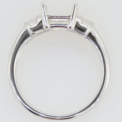 Sterling Silver semi mount ring setting for 9x7mm emerald, showcasing a sleek design without main gemstones.